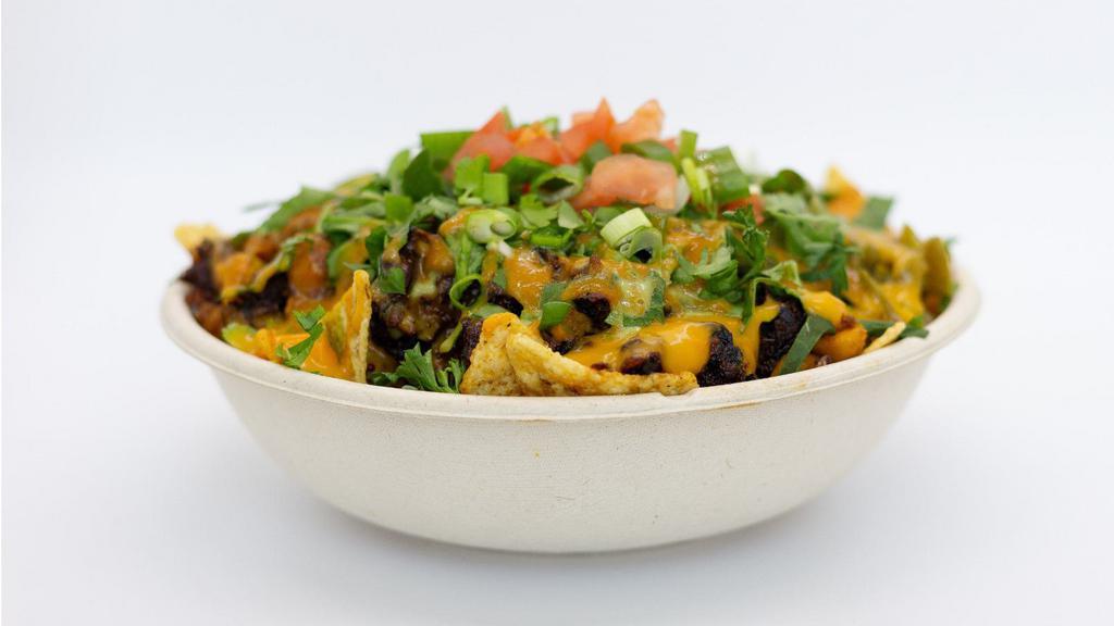 Big Papa Nachos · Base: jackfruits, red quinoa, curry garbanzo beans, gluten-free tortilla chips, spinach
Toppings: vegan cheese, , cilantro, parsley, tomatoes, green onions
Sauce: cilantro lime sauce and chipotle- mango.
Soy-Free, Gluten-Free, & Nut-Free
Contains; Coconut