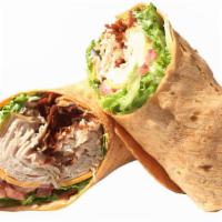 Turkey Bacon and Ranch Wrap · Smoked turkey, melted cheddar, bacon, ranch dressing, tomatoes, onions, and lettuce wrapped ...