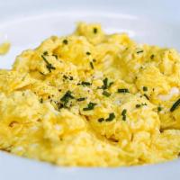 Scrambled Eggs with Salmon  · Four organic eggs scrambled soft with cream served with Smoked Salmon.