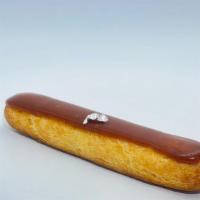 CHOCOLATE ECLAIR · Classic French eclair made with a pate à choux filled with a 70% dark chocolate cremeux and ...