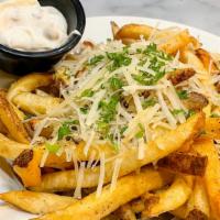Amazing Truffle Fries · house made rustic fries w/ delicious truffle aioli topped
w/ shredded parmesan & parsley