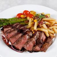 Ribeye Steak Frites · 10oz ribeye  steak w/ rustic fries, sauteed asparagus & cherry tomatoes