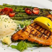 Salmon Filet · Grilled salmon filet with mashed potatoes, sautéed asparagus & cherry tomatoes