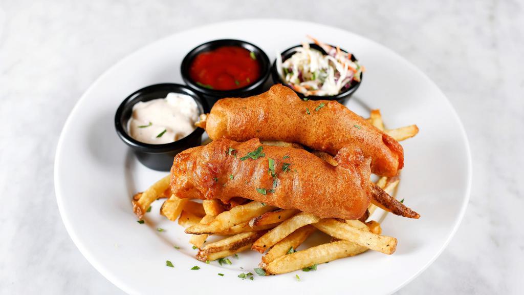 Fish and Chips · Two fried Alaskan Cod filets, with rustic fries, coleslaw & house tartar