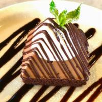Chocolate Overload · dark & white chocolate mousse on chocolate chiffon cake base w/dark chocolate drizzle