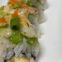 Popcorn Shrimp Roll · Crab salad, shrimp tempura, avocado, broiled shrimp, torched with French miso mayo sauce, un...