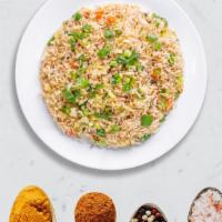 Golden Wall Veggie Fried Rice · Seasonal vegetables with basmati rice stir fried and cooked in Indian and Chinese sauces. Ve...