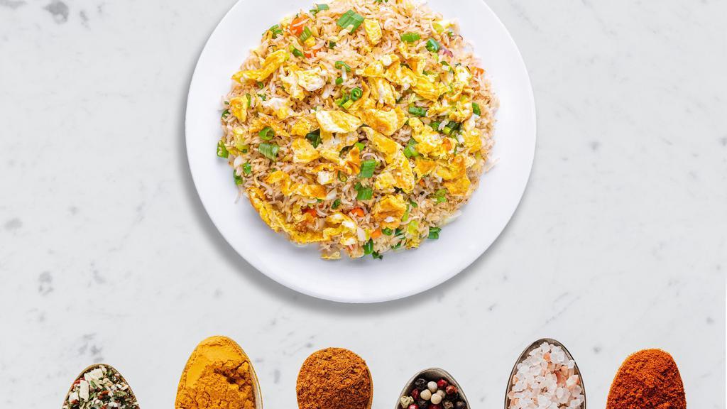 Egged On Fried Rice  · Egg with basmati rice stir fried and cooked in Indian and Chinese sauces
