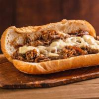 Bulgogi Cheesesteak · Thinly sliced steak, grilled onions and bulgogi sauce on a French roll and white american ch...