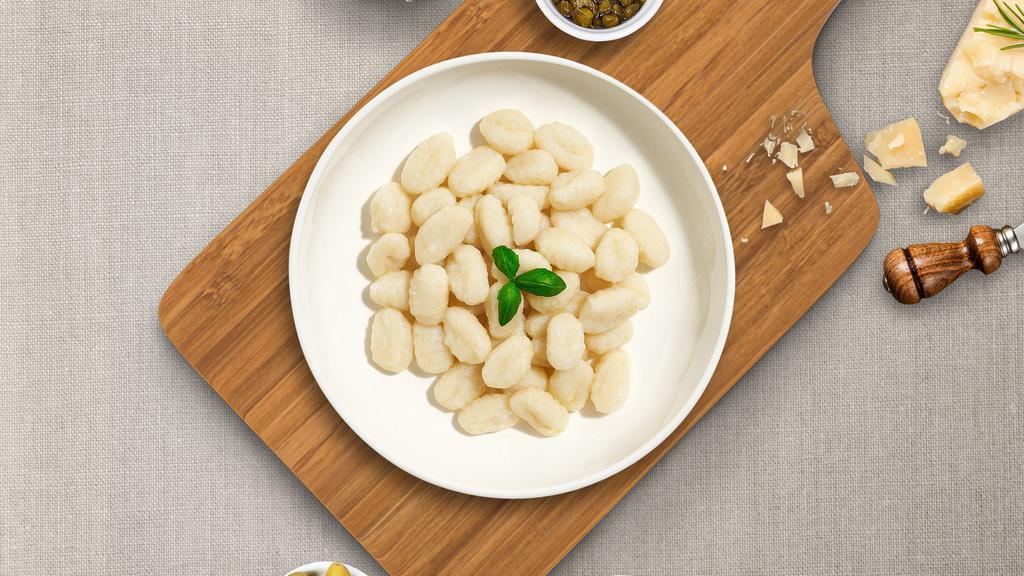 Your Own Truffle Gnocchi  · Gnocchi pasta stuffed with ricotta and parmesan cheese and fresh black summer truffles cooked with your choice of sauce, veggies, and meats, topped with Parmigiano-Reggiano cheese.