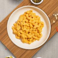 Mac and Cheese · Macaroni with four cheeses: gruyere, mozzarella, cheddar and parmesan
