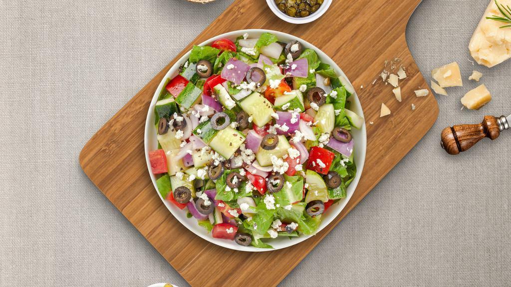 Greek Smack Salad  · Romaine lettuce, organic greens, Kalamata olives, Roma tomatoes, red onions, cucumbers, bell peppers and feta cheese served with our housemade creamy Greek dressing.
