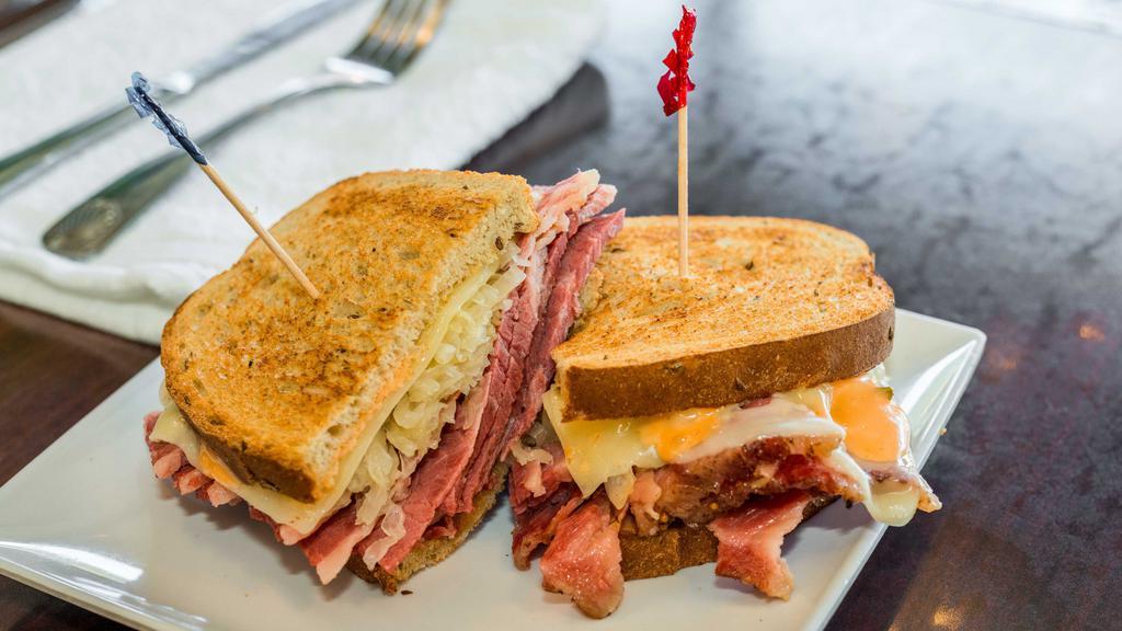 Reuben · Carved corned beef, sauerkraut, and Swiss on toasted rye. Voted best in the East bay!