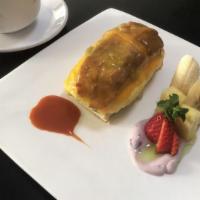Tex Mex Omelet Sandwich · Scramble eggs, pico de gallo, bacon, avocado, melted cheddar, sweet roll and fruits.