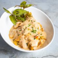 I'm Coco-Nuts About You (Coconut Red Curry Chicken) · 10 ounce skinless chicken thigh simmered in savory red coconut curry sauce. Nutrition Facts ...