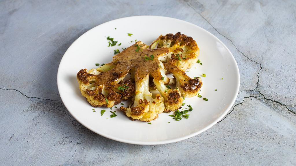 Caramelized Cauliflower · Cauliflower slices caramelized in clarified butter. Serving Size: 37.78 g | Carbohydrate: 11 g | Fat: 4 g | Protein: 4 g