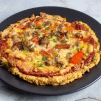 Sausage & Peppers · Low carb pizza crust made from shredded chicken, eggs and Parmesan! 2.5 grams carbs per slic...
