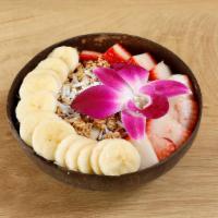 Acai Bowl · Strawberries, bananas, granola, coconut flakes, and honey.