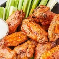 Chicken Wings · Bone-in wings tossed in your choice of spicy hayward hot wings, BBQ sauce, or lemon pepper.