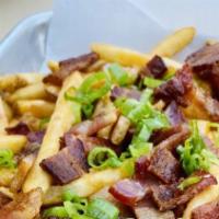 Bacon Cheese Fries · Golden fries topped with cheese, bacon, and green onions.
