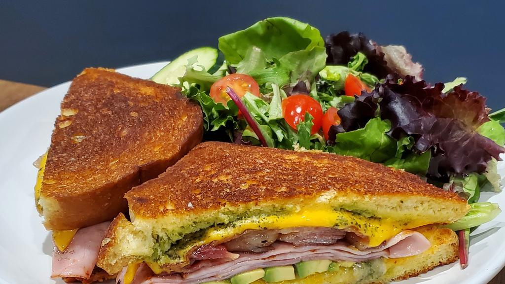 Pesto Grilled Cheese Sandwich · Add avocado, bacon, or ham,  griddled to perfection on Texas toast. Add avocado , bacon for an additional charge.