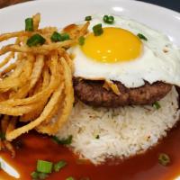The Locoest Moco · Seasoned beef patty over garlic fried rice. topped with a sunny egg and smothered in beef gr...