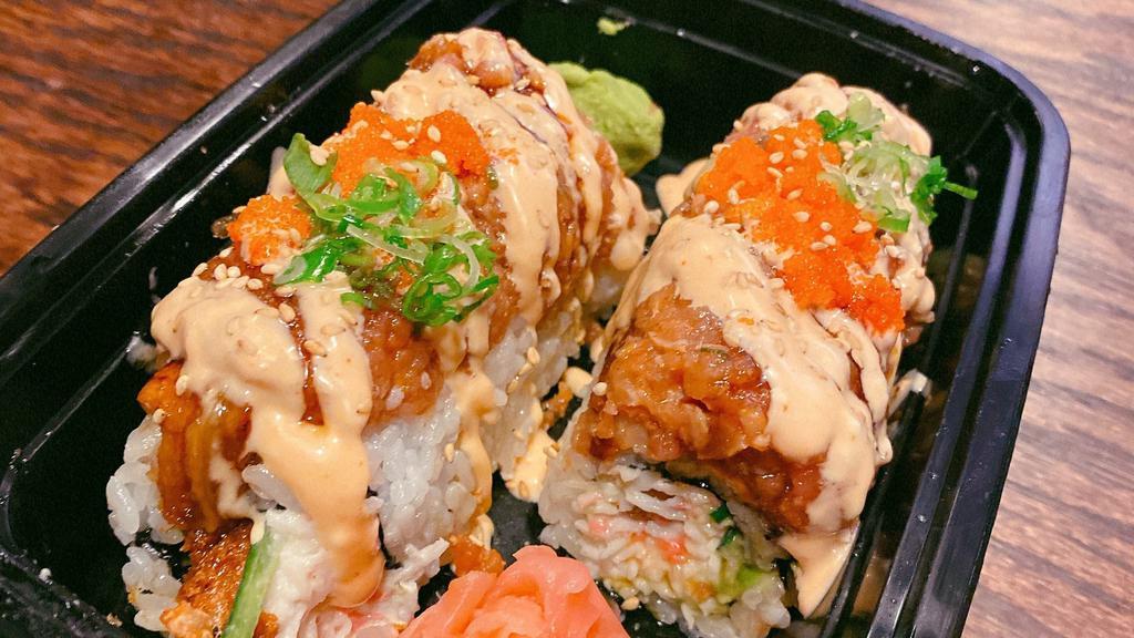 Ozu Dragon Roll · [Shrimp Tempura, Crabmeat, Avocado, Cucumber] 
Unagi, Spicy Tuna, Tobiko