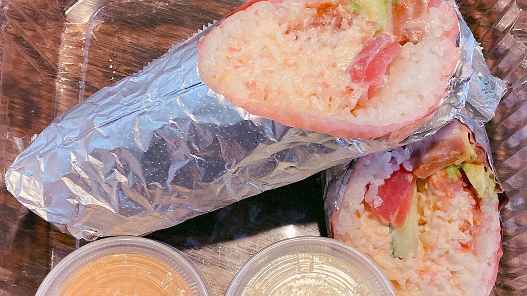 Sushi Burrito · [Spicy Crab Meat, Spicy Tuna, Tuna, Salmon, Avocado, Cucumber] 
Wrapped in  Soy Paper, House Sauce