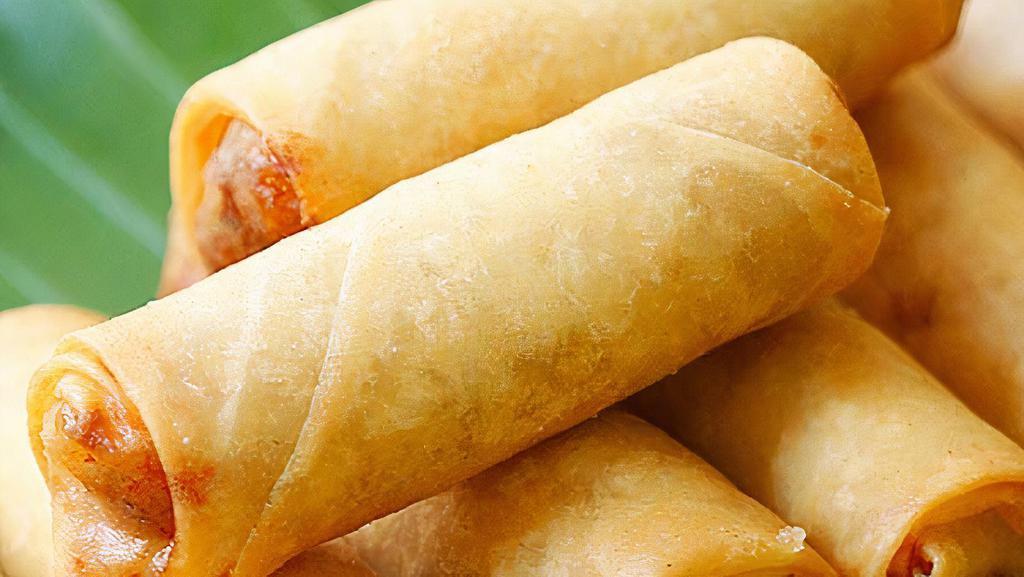 Veggie Spring · 4 pieces vegetable spring roll with sweet sour sauce.