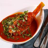 Lamb Shank · Lamb shank marinated overnight with ground spices and carefully braised in onion and tomato ...