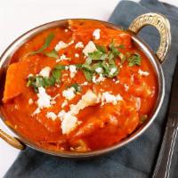 Kadai Paneer · Cottage cheese, green and red bell peppers and onion sautéed with aromatic spices.