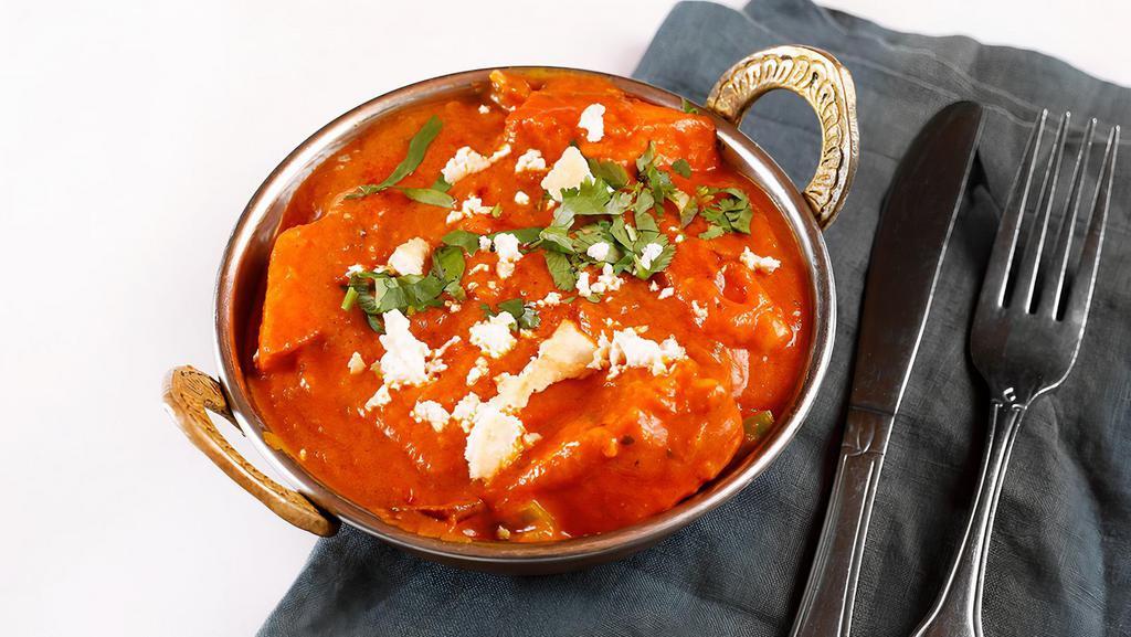 Kadai Paneer · Cottage cheese, green and red bell peppers and onion sautéed with aromatic spices.