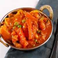Mixed Vegetable · Vegan. Seasonal vegetables cooked with onion and tomato gravy.