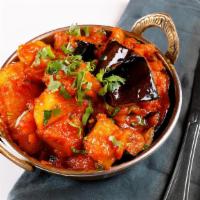 Aloo Baingan · Vegan. Spiced potatoes and eggplant cooked with curry style.