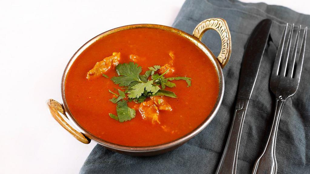 Chicken Tikka Masala · Roasted chicken breast cooked in creamy tomato and onion sauce.