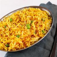 Jeera Rice · Basmati rice flavored with cumin and turmeric.