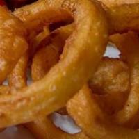 Onion Rings · Battered and deep fried onion rings.