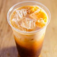 Thai Iced Tea (Organic Soy Milk) · Fresh Brewed Thai Iced Tea. Served Iced Cold with Organic Soymilk with Natural Vanilla Flavo...