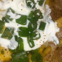 Sour Cream and Chives Potato  · Each Large potato is freshly made to order. 
Comes with Sour cream, chives ,green onions and...