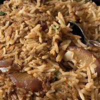 Chicken Biryani · Delicately spiced boneless, skinless chicken and basmati rice cooked with cashews, almonds a...