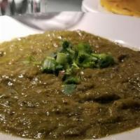Punjabi Special Saag · Mustard and spinach cooked with ginger and garlic in flavorful spices. A north Indian favori...
