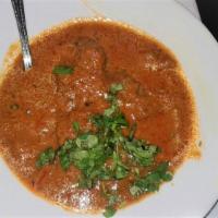 Lamb Curry · Lamb cooked in a mildly spiced traditional curry sauce.