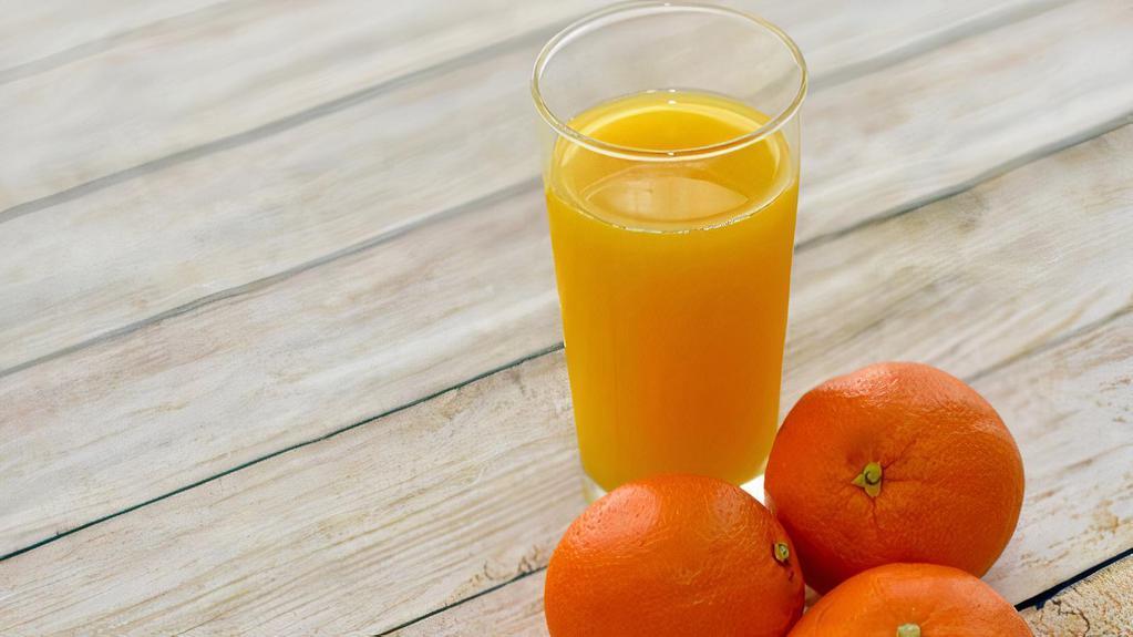 Freshly squeezed Orange Juice · Fresh 20 oz juice freshly squeezed with oranges.