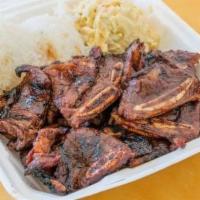 4. Kalbi Short Ribs · Includes two scoops of rice and choice of mac or green salad.