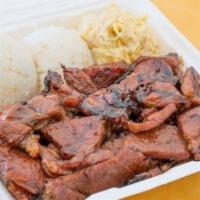 2. Pork Plate · Includes two scoops of rice and choice of mac or green salad.