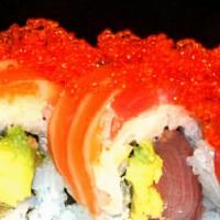 Under the Sea Roll · Yellowtail , avocado inside and topped with tuna, salmon eel, tobiko, unagi sauce.