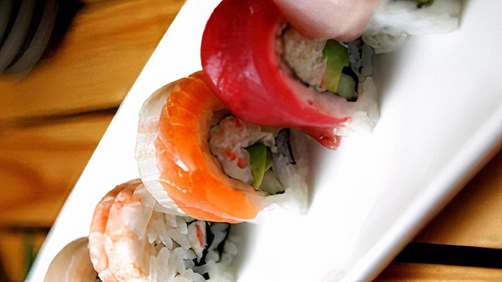 Rainbow Roll · Ca roll topped with various fish.
