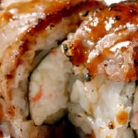 BBQ Roll · Deep-fried shrimp, crab, cucumber inside and topped with torched marinated teak, unagi sauce.