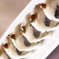 White Tuna Tataki Roll · Spicy. Spicy tuna, cucumber inside topped with seared albacore, green onion, ponzu sauce, ho...