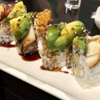Dragon Roll · Shrimp tempura, crab meat, cucumber, topped with unagi, avocado.